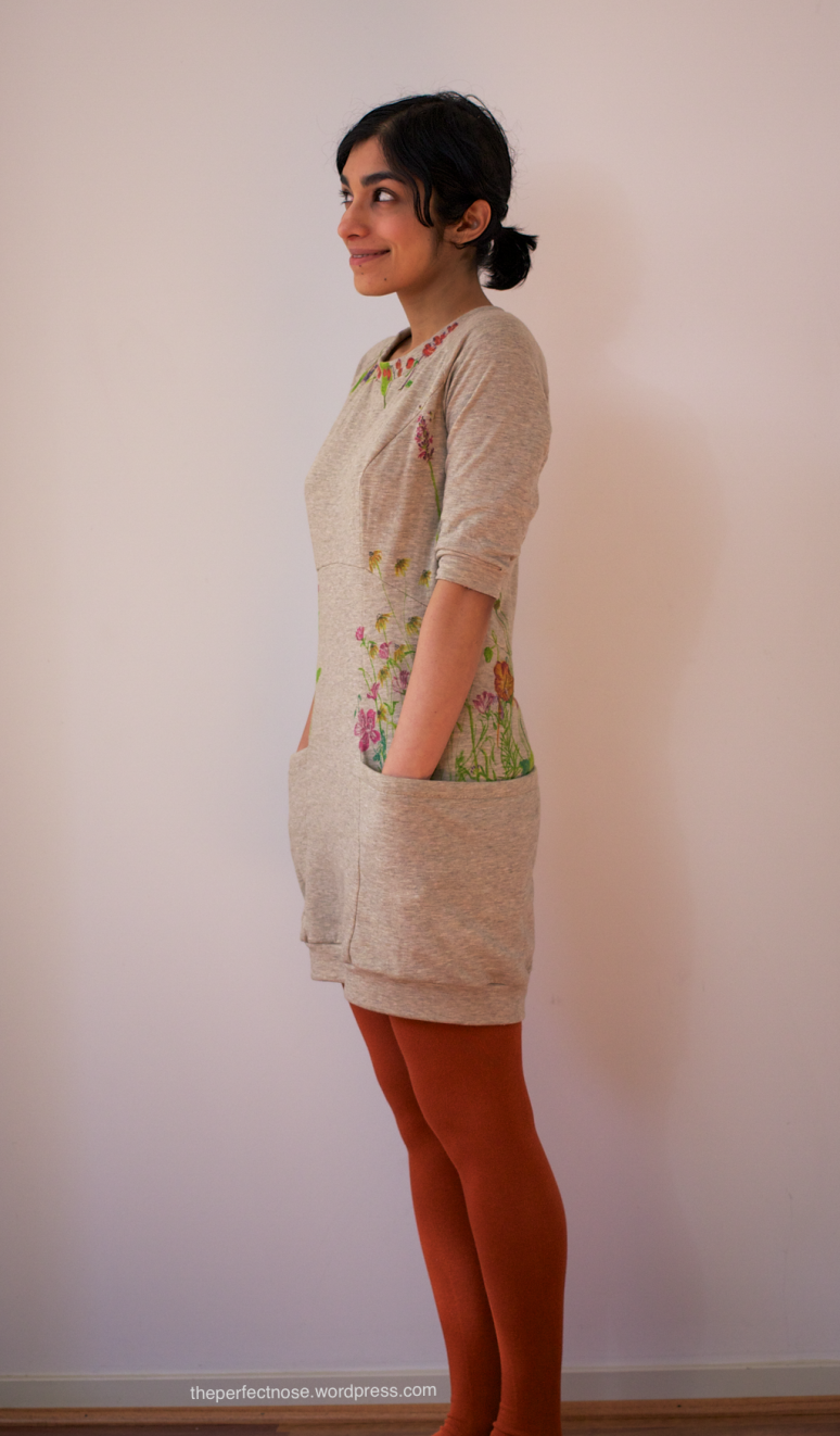 A knit fabric dress with handpainted flowers